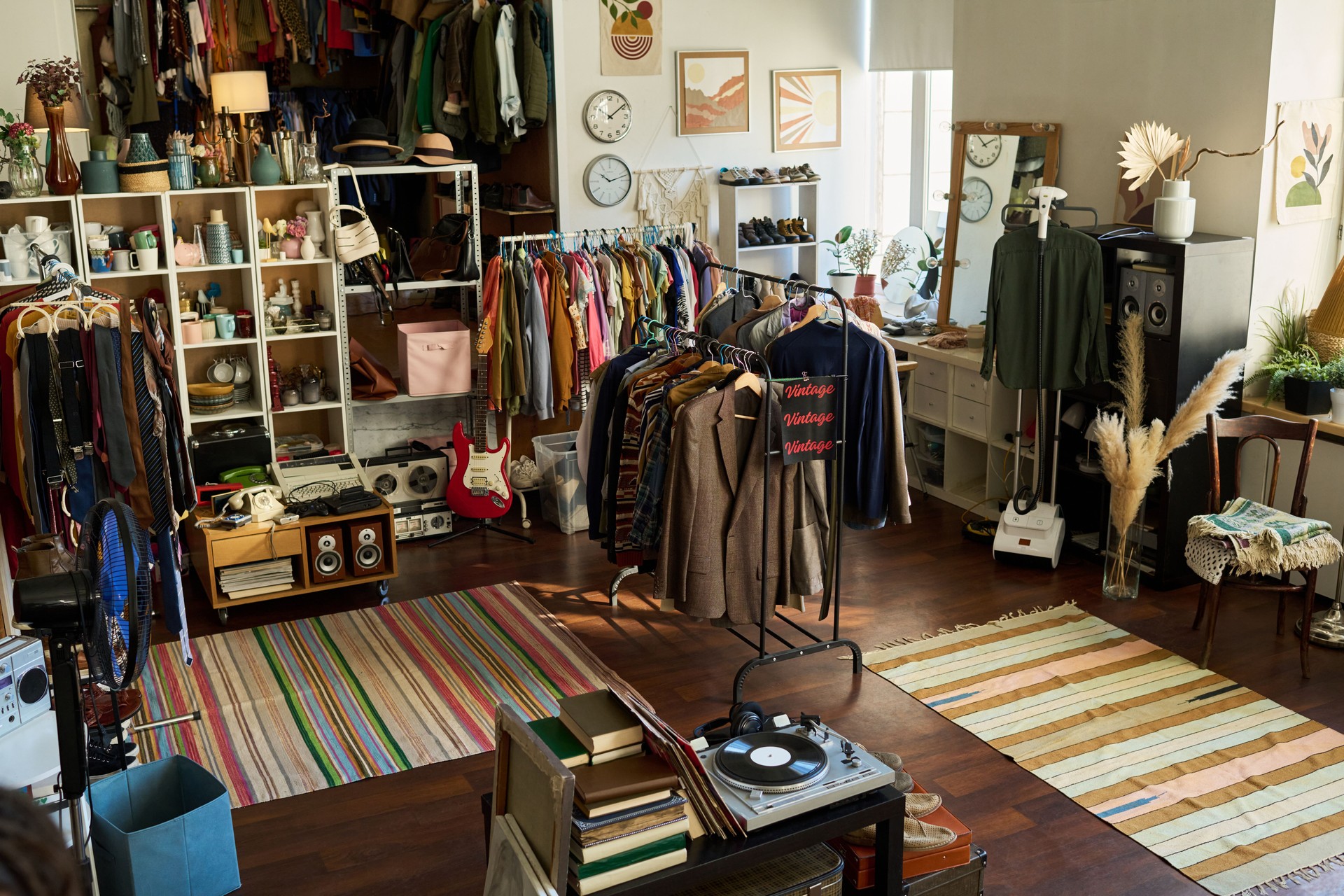 Vintage Clothing and Accessories Displayed in Organized Thrift Shop Interior